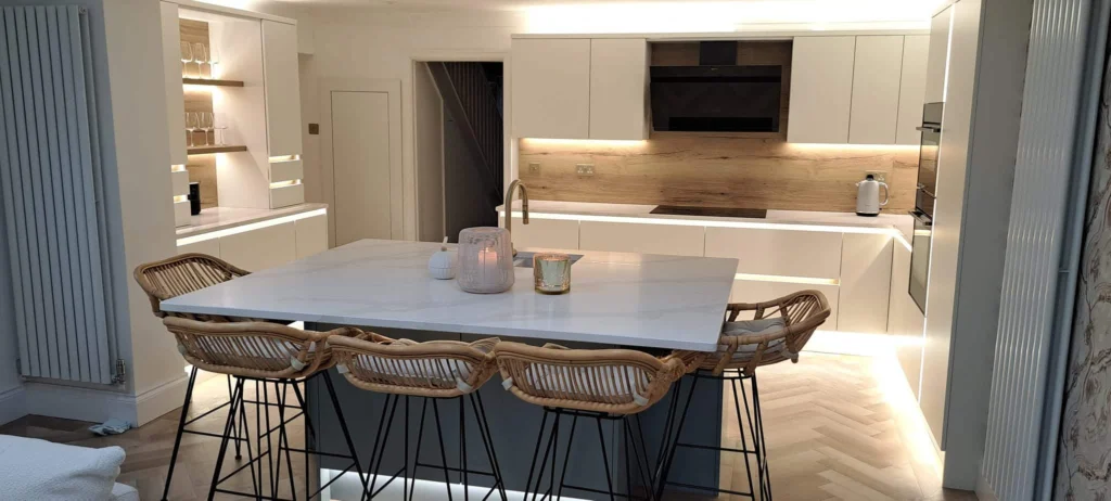 Kitchen island with seating and hidden storage in an open plan Wigan kitchen